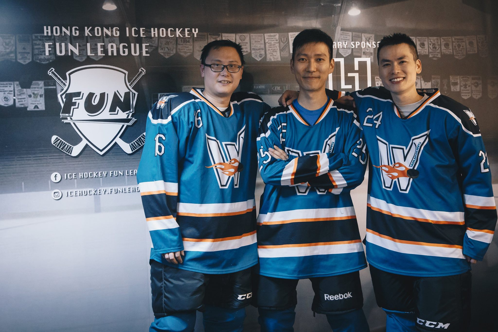 Teammates at the FUN League wall